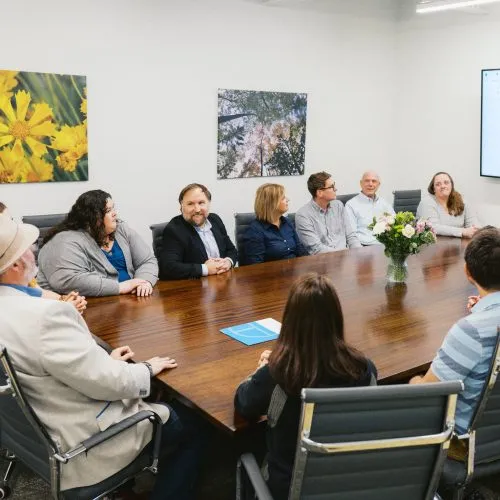 Intrust CPA team meeting with a business client